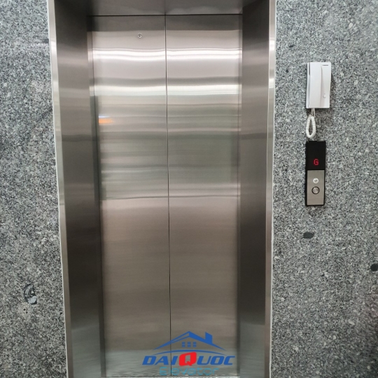 THANG MÁY TẢI KHÁCH LAMINATE