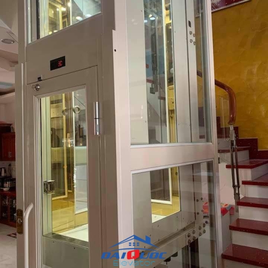 THANG MÁY HOMELIFT LỒNG KÍNH CỬA MỞ TAY