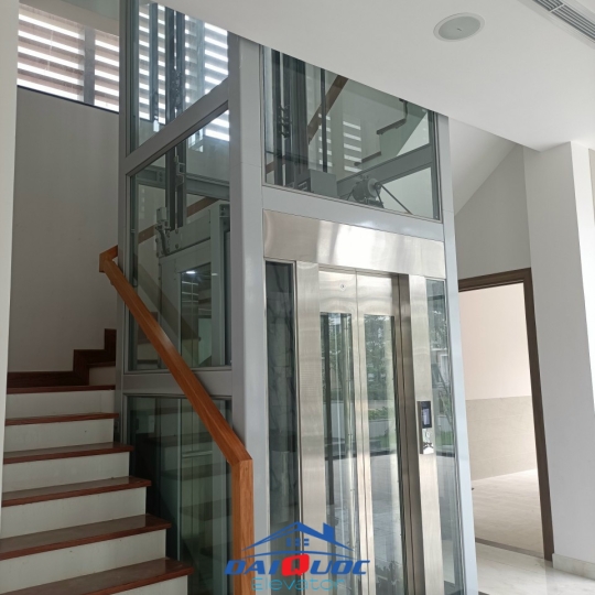 thang homelift lồng kính cửa mở tự động