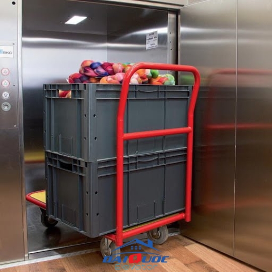 THANG MÁY TẢI RÁC CAO ỐC